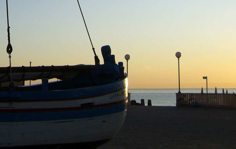 Early dawn reflected in the waters of Porto Recanati